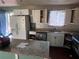 Kitchen featuring stainless steel appliances, gray backsplash, and bright natural light at 5430 Old Bill Cook Rd, Atlanta, GA 30349
