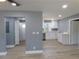 Open floorplan from the living room into the kitchen, with lots of open space at 1546 Alverado Way, Decatur, GA 30032