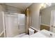 Bathroom featuring a shower and tub combo with sliding glass doors at 3336 Franklin Forest Dr, Winston, GA 30187