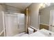 Cozy bathroom featuring a tub shower and a sliding glass door at 3336 Franklin Forest Dr, Winston, GA 30187