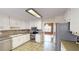 Spacious kitchen featuring stainless steel appliances, tile flooring, and a seamless connection to other living spaces at 3336 Franklin Forest Dr, Winston, GA 30187