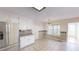Bright kitchen with stainless steel appliances, tile floors, and a view into the breakfast nook at 3336 Franklin Forest Dr, Winston, GA 30187