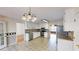 Well-lit kitchen featuring stainless steel appliances, tile flooring, and stylish cabinetry at 3336 Franklin Forest Dr, Winston, GA 30187