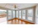 Bright sunroom features lots of windows and natural light and access to the rear deck at 3336 Franklin Forest Dr, Winston, GA 30187