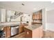 Spacious kitchen featuring granite countertops, stainless steel appliances and open floorplan at 5430 Falls Landing Dr, Cumming, GA 30040
