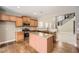 Well-lit kitchen with granite countertops and stainless steel appliances at 5430 Falls Landing Dr, Cumming, GA 30040