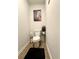 Small bathroom with a toilet and clean, minimalist decor at 1367 Midnight Ride Ct, Hampton, GA 30228