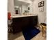Bathroom vanity with double sinks and a granite countertop at 1367 Midnight Ride Ct, Hampton, GA 30228
