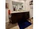 Bathroom vanity with double sinks, a large mirror, and sleek lighting at 1367 Midnight Ride Ct, Hampton, GA 30228