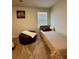 Neutral bedroom featuring natural light and lion-themed art print at 1367 Midnight Ride Ct, Hampton, GA 30228