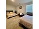 Shared bedroom featuring neutral paint colors, natural light, and lion themed art print at 1367 Midnight Ride Ct, Hampton, GA 30228