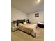 Comfortable bedroom featuring neutral paint colors, natural light, and a lion art print at 1367 Midnight Ride Ct, Hampton, GA 30228