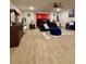 Large bedroom features a dark wood bed, blue furniture, and ample space for relaxing at 1367 Midnight Ride Ct, Hampton, GA 30228