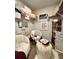 Cozy closet area with comfortable seating and decorative accents at 1367 Midnight Ride Ct, Hampton, GA 30228