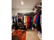 Walk-in closet with ample storage and clothing racks and shelves at 1367 Midnight Ride Ct, Hampton, GA 30228