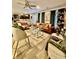 Spacious living room with plush sofas, stylish décor, and abundant natural light creating a welcoming atmosphere at 1367 Midnight Ride Ct, Hampton, GA 30228