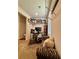 The office is designed with practical storage solutions, featuring shelving, a desk setup, and a zebra-patterned sofa at 1367 Midnight Ride Ct, Hampton, GA 30228