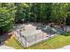 Full outdoor basketball court with multiple hoops and lighting, great for sports and recreation at 2869 Amesbury Nw, Kennesaw, GA 30144