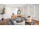 Cozy home office with hardwood floors, two armchairs, and a window with natural light at 2869 Amesbury Nw, Kennesaw, GA 30144