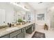 Bathroom boasts double vanity with granite countertops, soaking tub, and glass shower at 2869 Amesbury Nw, Kennesaw, GA 30144