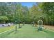 Outdoor workout area featuring exercise equipment and artificial turf, for residents' fitness at 2869 Amesbury Nw, Kennesaw, GA 30144