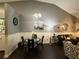 Open living area features a dining space that flows into the living room at 6706 Sunset Valley Cir, Rex, GA 30273