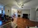 Bright and airy living room with fireplace and open floor plan at 3835 Pleasant Oaks Dr, Lawrenceville, GA 30044