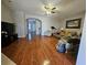 Large living room with hardwood floors and an open concept at 3835 Pleasant Oaks Dr, Lawrenceville, GA 30044