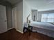 Main bedroom with hardwood floors, a ceiling fan, and a comfortable atmosphere at 3835 Pleasant Oaks Dr, Lawrenceville, GA 30044