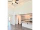 Open-concept kitchen with granite countertops, stainless steel appliances, and a center island at 4853 Walkers Green, Mableton, GA 30126