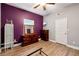 The bedroom is a blank canvas with nice flooring, a dresser and a window for natural light at 4240 N Braves Cir, Douglasville, GA 30135