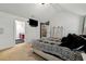 Spacious main bedroom featuring high ceilings, neutral walls, and ensuite bathroom access at 4240 N Braves Cir, Douglasville, GA 30135