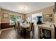 Dining room featuring a modern table set, hardwood floors, and plenty of room to entertain at 4240 N Braves Cir, Douglasville, GA 30135