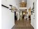 Bright, open foyer featuring hardwood floors and a view of the staircase and upper level at 4240 N Braves Cir, Douglasville, GA 30135