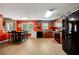 Bright kitchen and dining area with wood cabinets, black appliances, and ample counter space at 4240 N Braves Cir, Douglasville, GA 30135