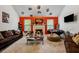 Large and stylish living room showcasing a fireplace and natural light at 4240 N Braves Cir, Douglasville, GA 30135
