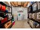 A utilitarian storage room with shelves for storage and a washer and dryer at 4240 N Braves Cir, Douglasville, GA 30135