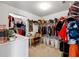 Massive walk-in closet with custom shelving and organizational units at 4240 N Braves Cir, Douglasville, GA 30135