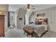 Bedroom with angled ceiling features a bed, neutral paint, and a window at 5810 Ripplestone Nw Ct, Acworth, GA 30101