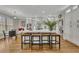 Bright kitchen with white cabinets, a large center island, and stainless steel appliances at 5810 Ripplestone Nw Ct, Acworth, GA 30101