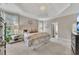 Spacious main bedroom with a tray ceiling, carpet flooring, and neutral paint colors at 5810 Ripplestone Nw Ct, Acworth, GA 30101