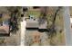 An aerial view of the property that shows the home's position and street access at 170 Dillard Ne Dr, Kennesaw, GA 30144