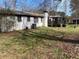 Spacious backyard with mature trees, offering plenty of room for outdoor activities and relaxation at 170 Dillard Ne Dr, Kennesaw, GA 30144