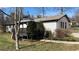 Charming home with a well-maintained backyard and a pergola-covered patio, ideal for outdoor gatherings at 170 Dillard Ne Dr, Kennesaw, GA 30144