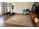 Finished basement featuring a home gym, entertainment area, and a large area rug at 170 Dillard Ne Dr, Kennesaw, GA 30144