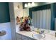 Bathroom featuring double sinks with marble countertops at 170 Dillard Ne Dr, Kennesaw, GA 30144
