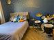 Unique bedroom featuring a drum set beside the bed, accented with star decals on the wall, creating a fun space at 170 Dillard Ne Dr, Kennesaw, GA 30144