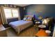 Unique bedroom featuring a drum set beside the bed, accented with star decals on the wall, creating a fun space at 170 Dillard Ne Dr, Kennesaw, GA 30144