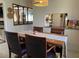 Charming dining area featuring a wooden table, seating for six, and decorative lighting fixture at 170 Dillard Ne Dr, Kennesaw, GA 30144