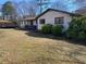 Well-maintained single-story home with manicured lawn and mature trees at 170 Dillard Ne Dr, Kennesaw, GA 30144